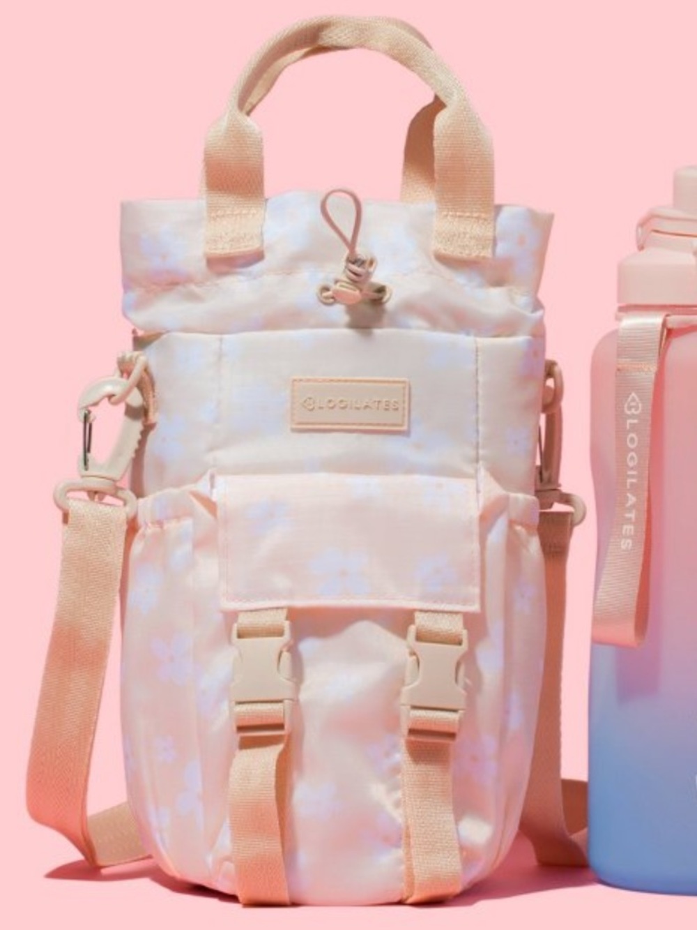 Blogilates Water Bottle Sling - Peach: Polyethylene &
Polyester new 🆕